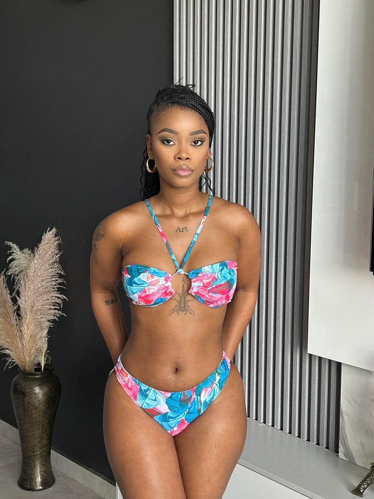 Model wearing the Siliana Floral Bikini with vibrant floral print and keyhole detail, from Vera’s Closet.