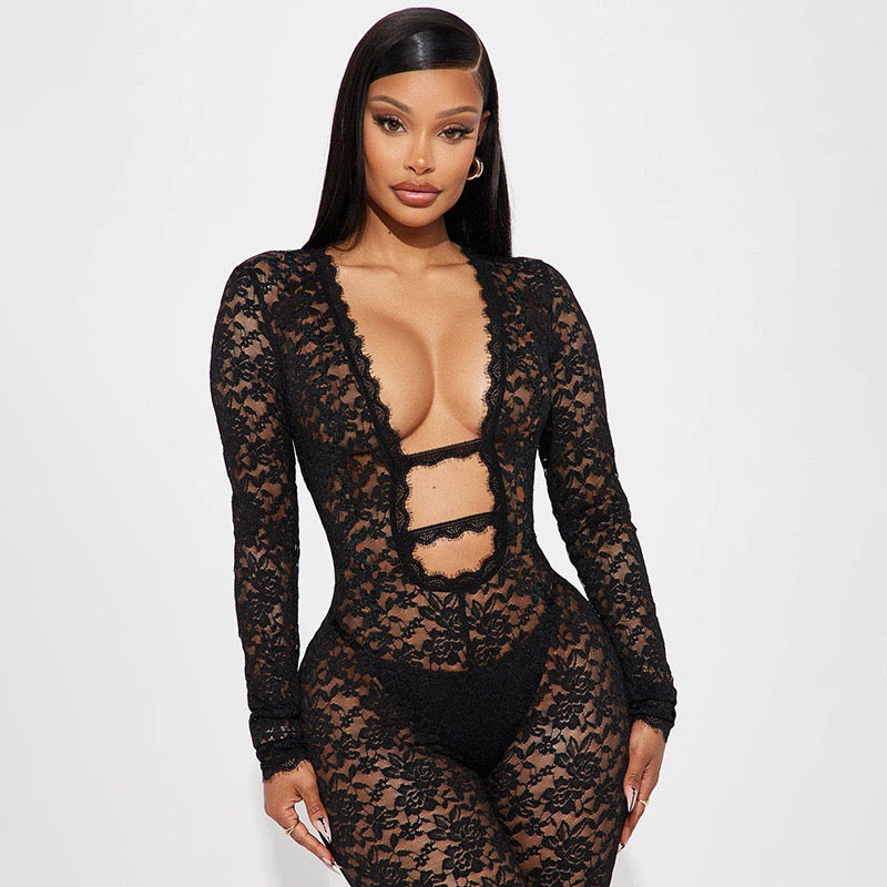 Celeste Lace Jumpsuit in sheer black floral lace with long sleeves and cut-out details