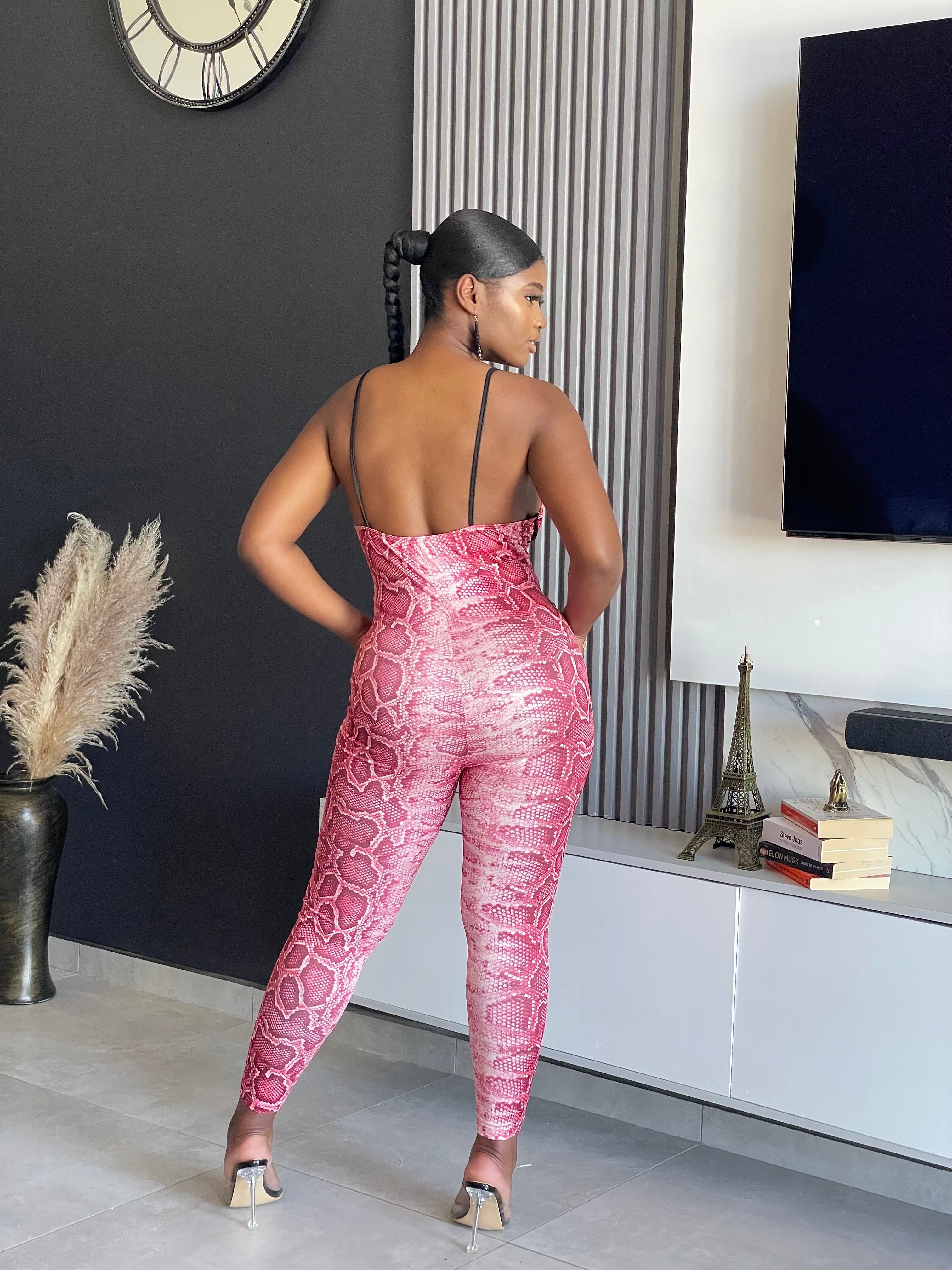 Diva Jumpsuit in pink snakeskin print with bold style and figure-flattering fit