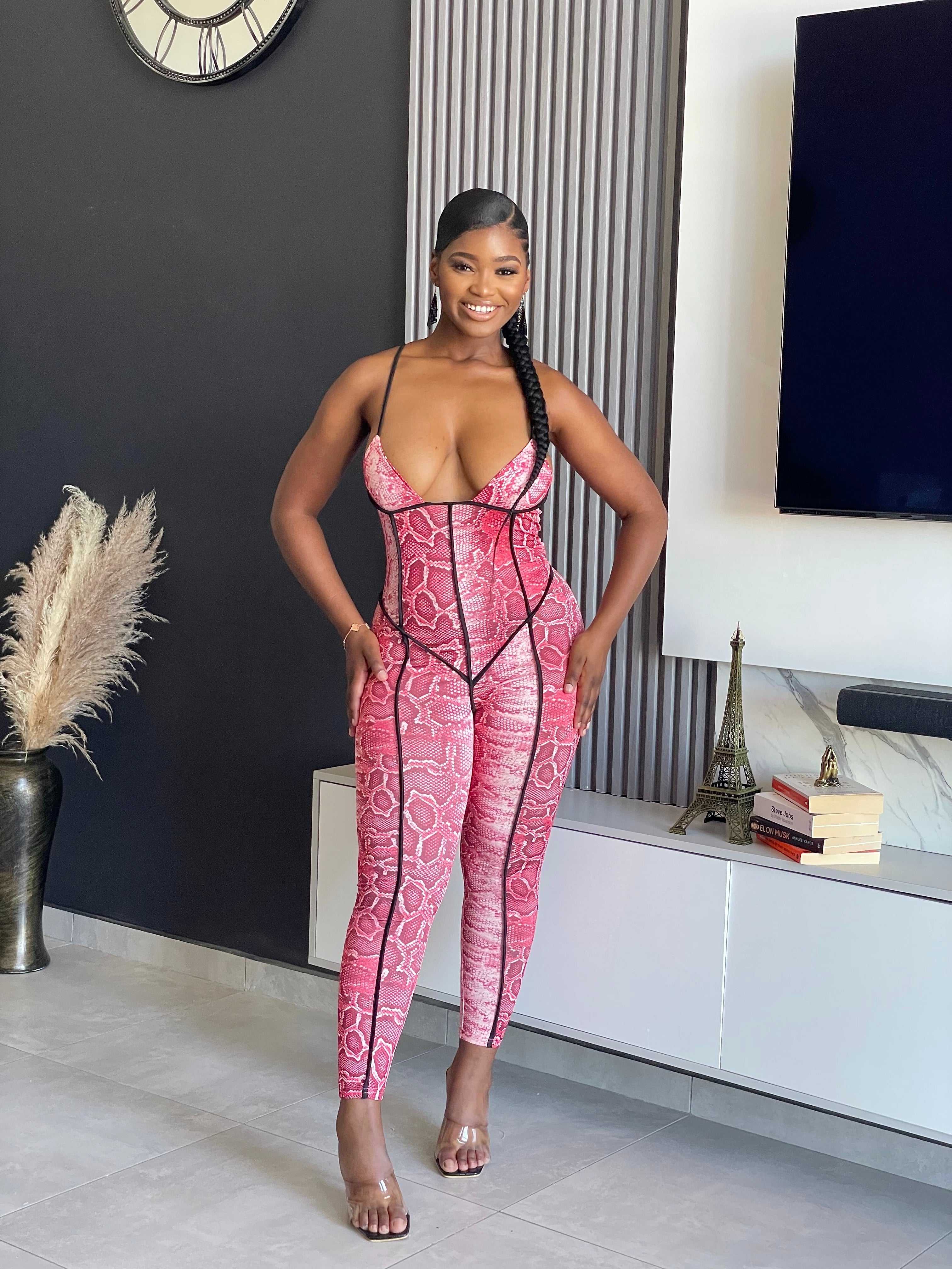 Diva Jumpsuit in pink snakeskin print with bold style and figure-flattering fit