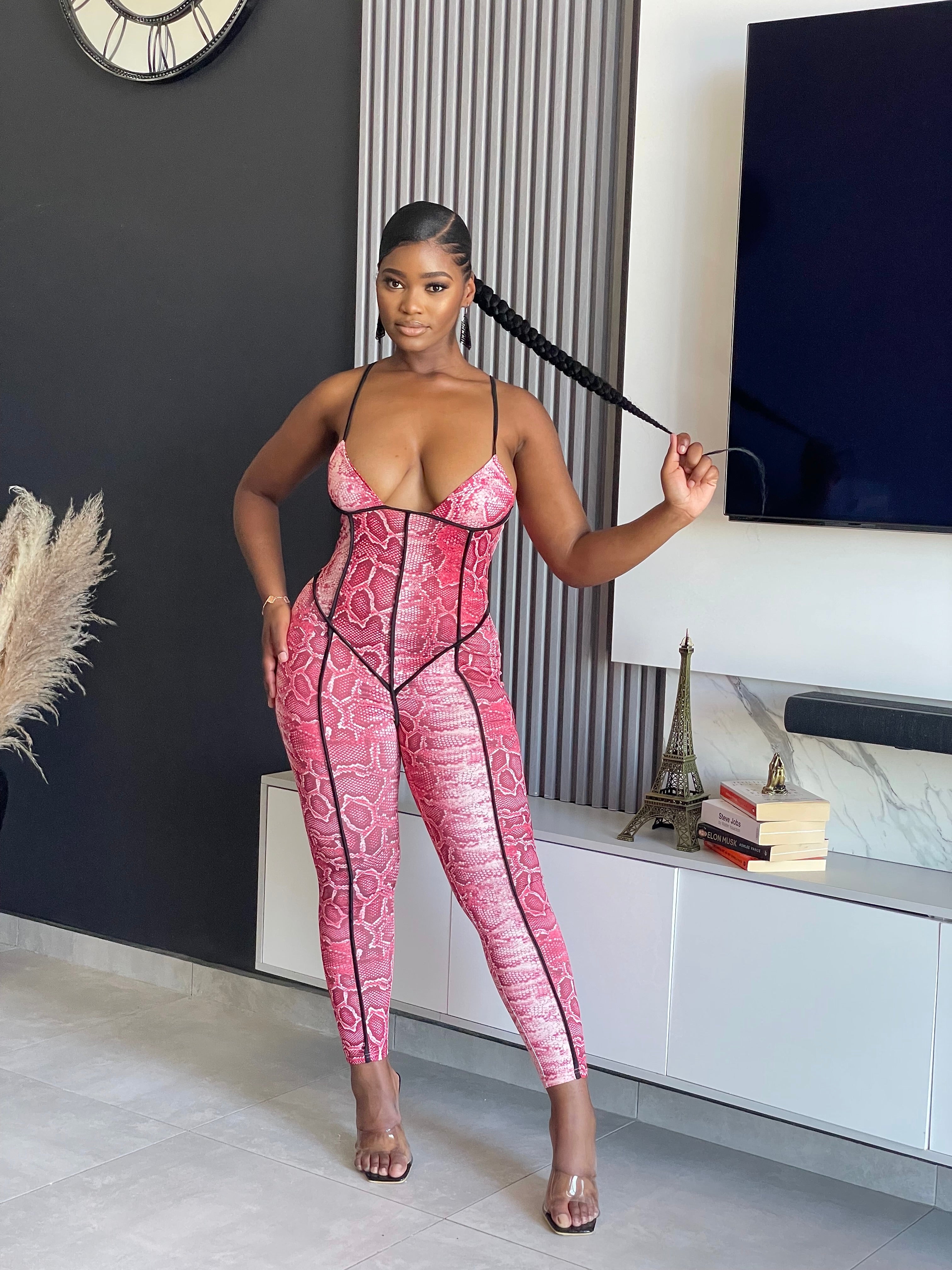 Diva Jumpsuit in pink snakeskin print with bold style and figure-flattering fit