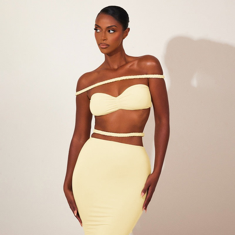 Obsidian Two-Piece Gown in yellow with off-shoulder crop top and maxi skirt