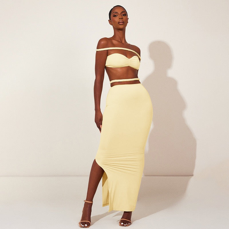 Obsidian Two-Piece Gown in yellow with off-shoulder crop top and maxi skirt