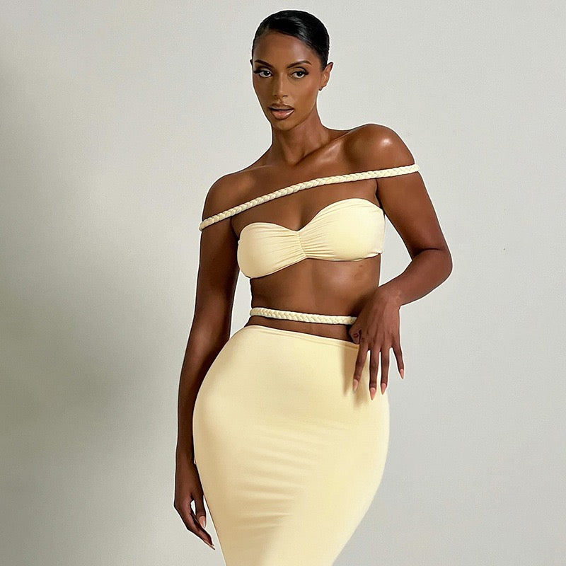 Obsidian Two-Piece Gown in yellow with off-shoulder crop top and maxi skirt