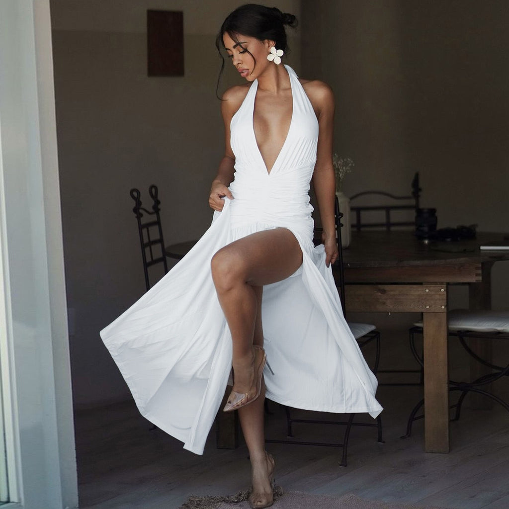 Shoza Halter-Neck Draped Maxi Dress in White with plunging neckline and thigh-high slit