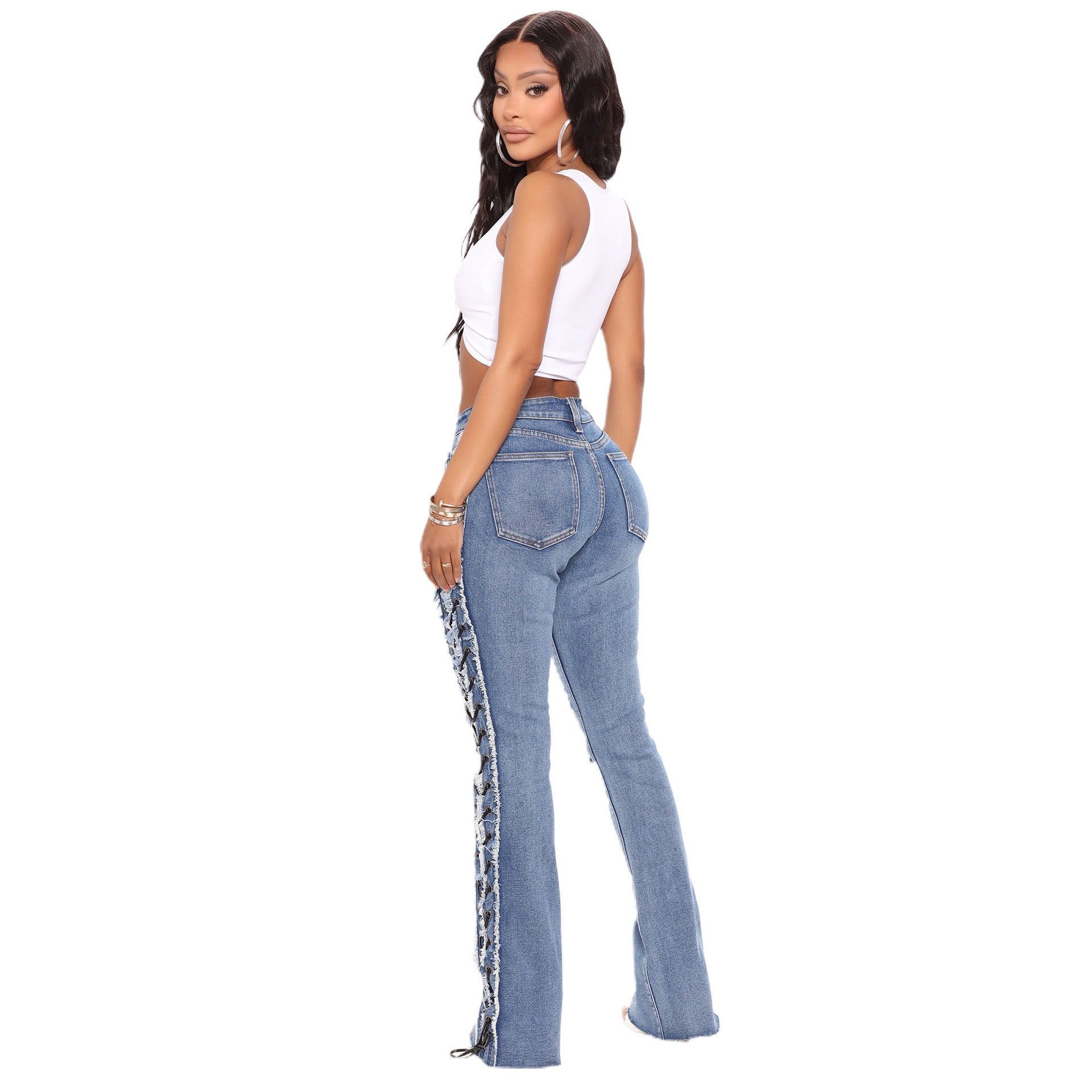 High-waisted distressed jeans with lace-up side panels and ripped denim details