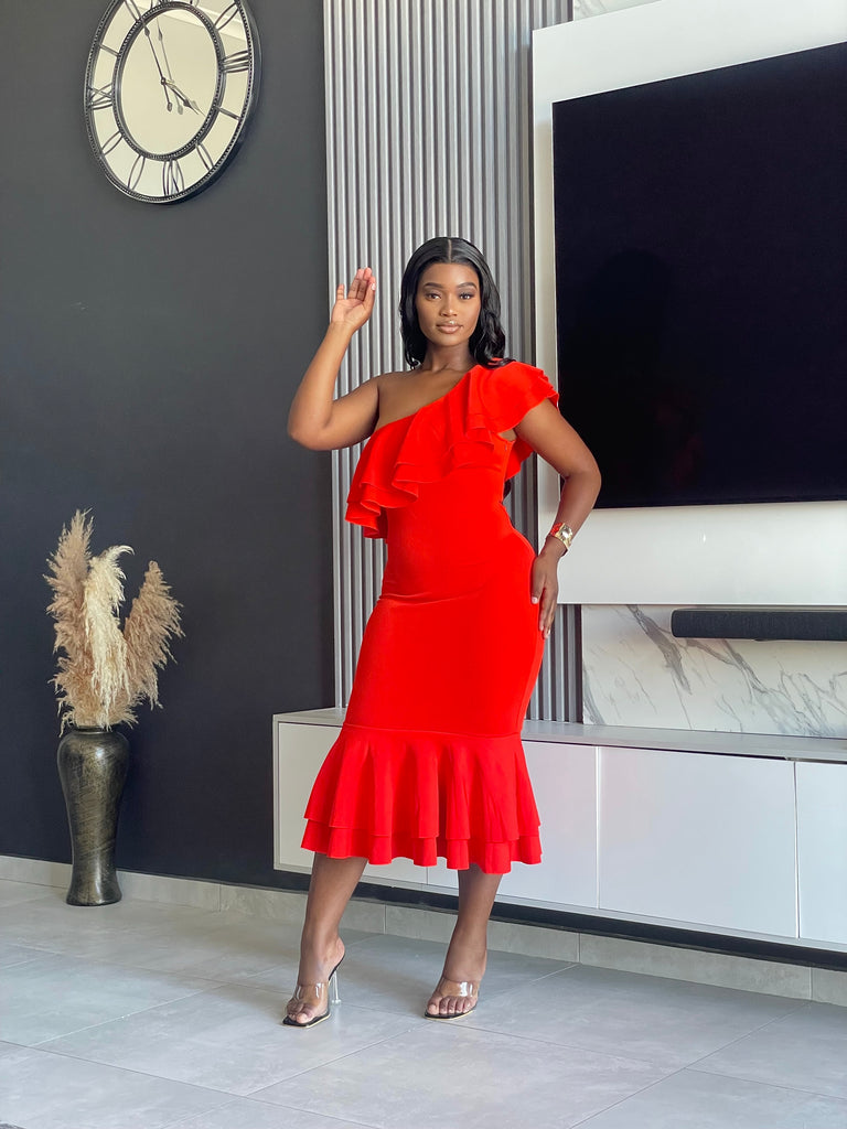 Embrace elegance with the Edeline Midi Dress, featuring a striking red hue and stylish ruffle accents. Perfect for any special occasion or evening event. Shop now!